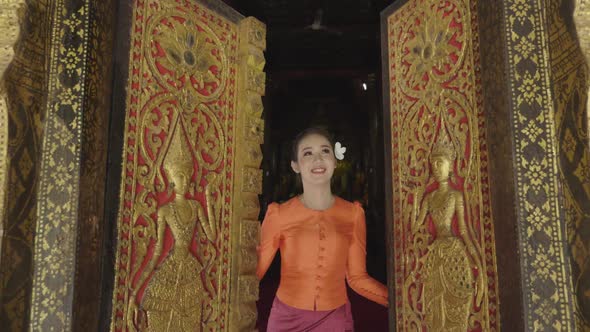 Girl Wearing Lao Traditional Dress Costume Opening Door's Temple