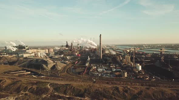 Aerial view of factory Tata Steel with smoking chimneys in Holland