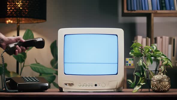 Old Television with Blue Interference Screen on Home Background