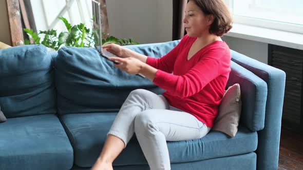 Middleaged Woman Shopping Online