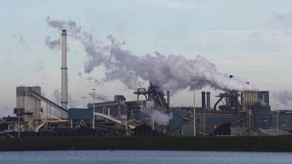 Aerial view of factory Tata Steel with smoking chimneys in Holland