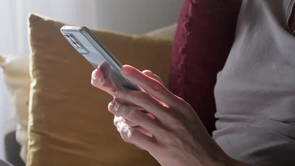 Man using smartphone.