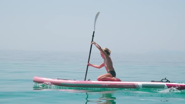 Kid on Paddle Board