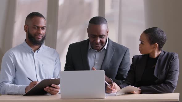 African Business Team Partners Colleagues Young Afro Businesswoman and Adult Black Man Employer