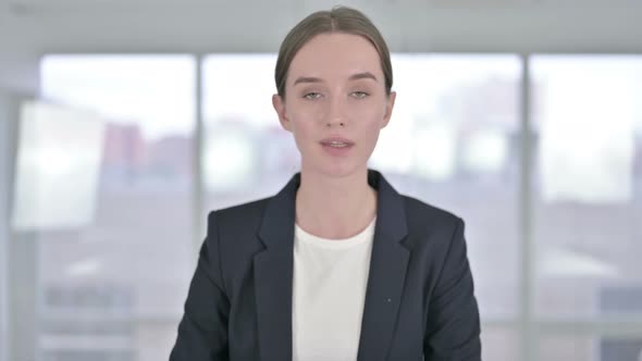 Portrait of Beautiful Young Businesswoman Doing Video Chat