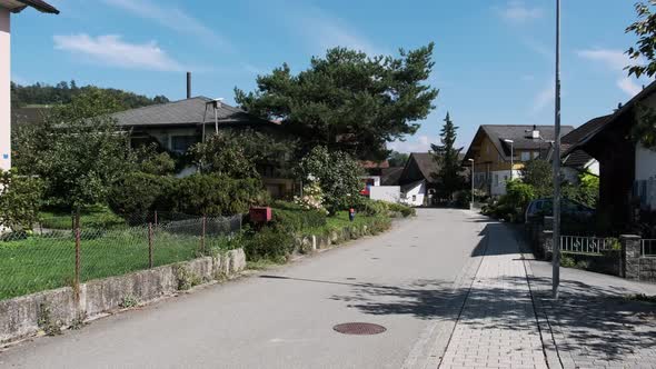 Empty Street in Alps Mountain Eschen City Liechtenstein Houses on the Sides