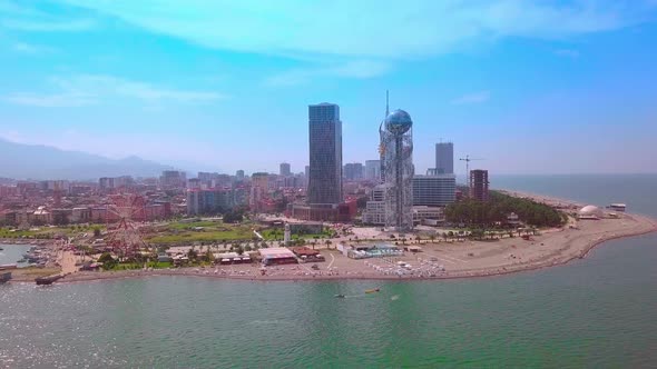 seaside beach of Batumi, skyscrapers, city, Shooting from drone from air.