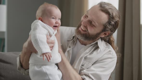 Happy Caucasian Family at Home Game Bearded Father with Little Daughter Son Kid Newborn Infant