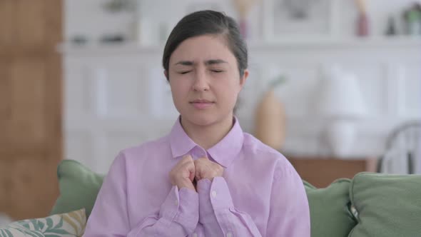 Portrait of Indian Woman Praying with Hands Crossed