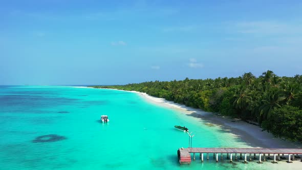 Aerial above scenery of exotic resort beach break by shallow sea with bright sandy background of a d