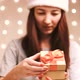 Woman Opening a Gift Box and Smiling - VideoHive Item for Sale