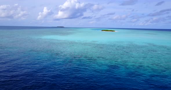 Natural flying abstract view of a white paradise beach and turquoise sea background in high resoluti