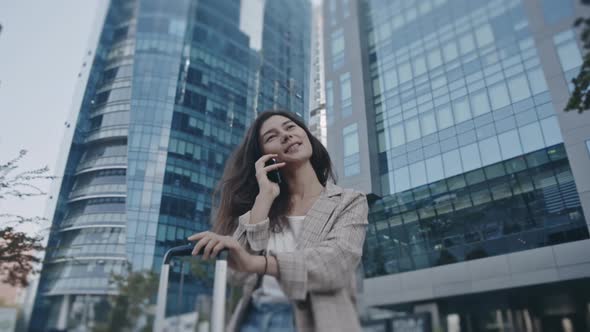 Portrait of Beautiful Businesslady Checking Phone