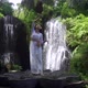 Feminity and Nature Concept Astonishing Woman Dancing in Front of a Huge Majestic Tropical Waterfall - VideoHive Item for Sale