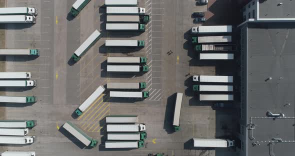 Buildings of Logistics Center, Warehouses Near the Highway, View From Height, a Large Number