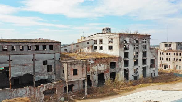 Abandoned industrial building. Ruins of an old factory. Aerial view