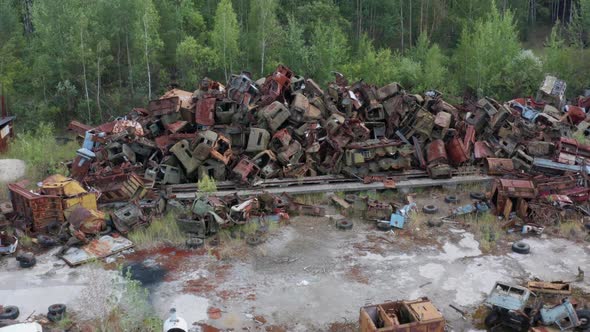 Drone Flight Over Pile of Rusty Scrap in Chernobyl