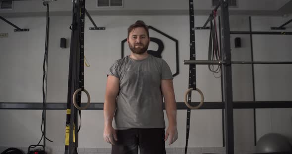 Portrait of a Caucasian Man Looking at Camera in a Gym