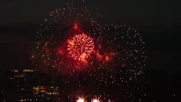 Bright firework over a city in the summer night