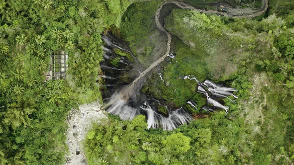 Drone Flight Rotating Over Edge Of Tumpak Sewu Waterfalls