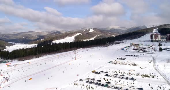 Aerial View of the Ski Resort in Mountains at Winter