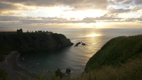 The Dunnottar Castle and the North Sea at sunrise