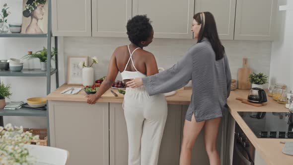 Slowmo of LGBTQ Couple in Cozy Kitchen