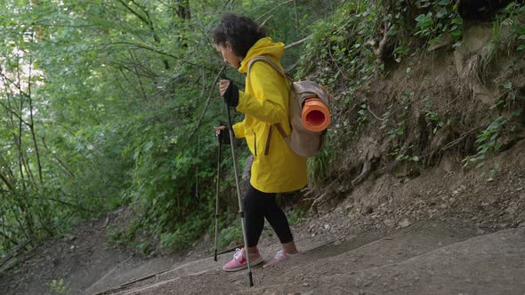 Girl on Hiking Trail in the Woods