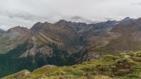 timelapse of cloud motion over Cirque de Gavarnie with waterfall at pyrenees mountains, France