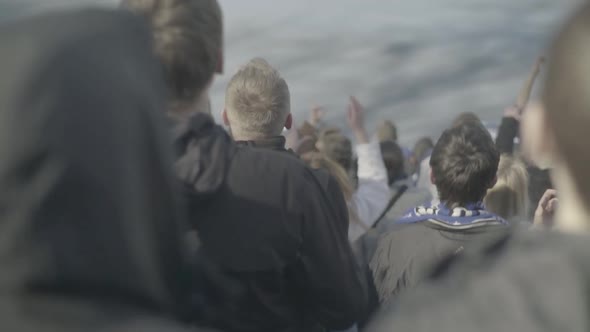 Fans at the Stadium During the Match. Slow Motion.