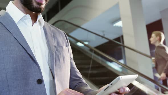 Businessman using digital tablet