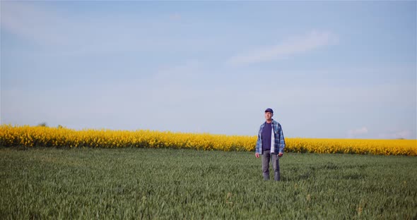 Agriculture Farmer Walking on Field.