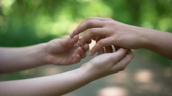 Lesbian Wedding, Same-Sex Partners Wearing Rings on Ceremony, Creating Family