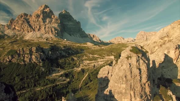 Aerial view of Tre Cime mountains in Dolomites on sunny summer day