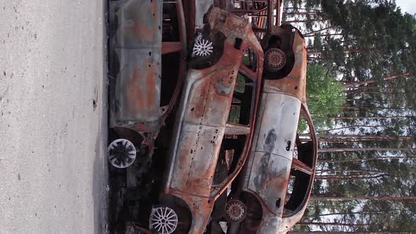 Vertical Video of Burnt Cars During the War in Ukraine