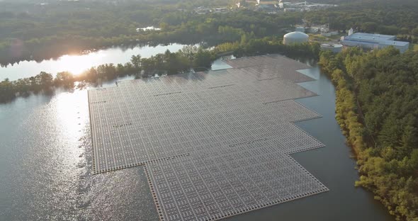 Aerial View of Floating Solar Panels Cell Platform System on the Lake