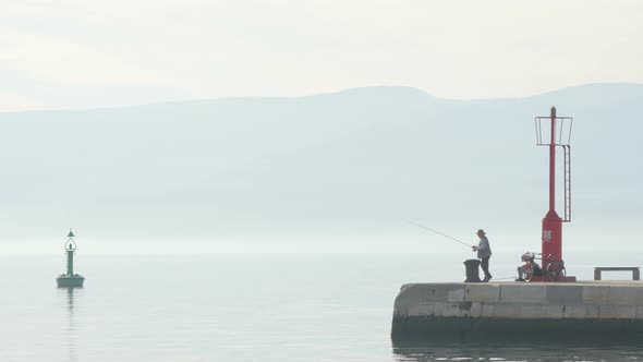 Two men fishing in Rijeka