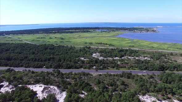 Aerial drone view of a highway near the beach
