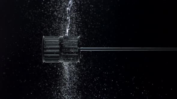 Water spun and making splash, Slow Motion alt