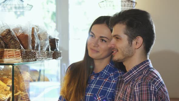 Lovely Couple Choosing Desserts at the Bakery Store