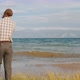 Man is resting by the lake Summer Baikal lake Olkhon island - VideoHive Item for Sale