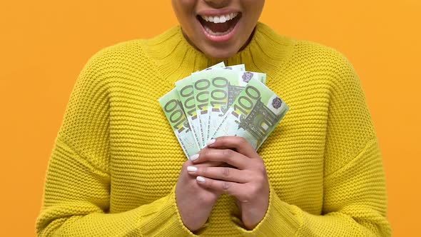 Happy Afro-American Woman Showing Euro Bills, Financial Success, Investment