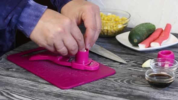 The Man Grinds The Chives On A Grater