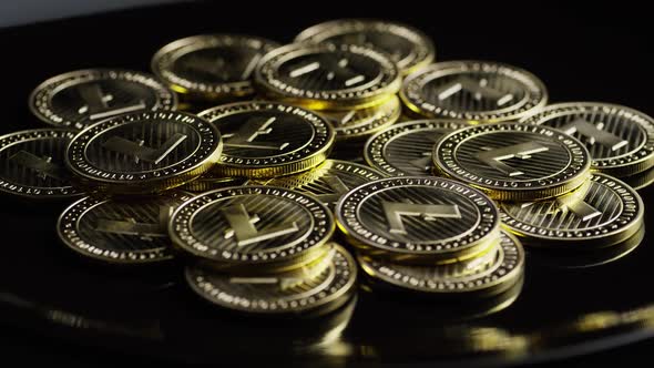 Rotating shot of Bitcoins (digital cryptocurrency) - BITCOIN LITECOIN 257