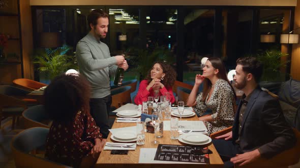 Adults Group Enjoy Restaurant Meeting at Table