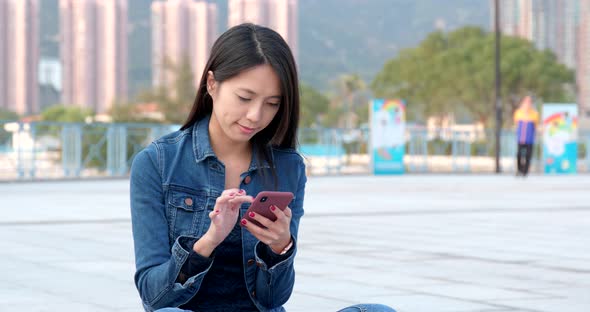 Woman use of smart phone at outdoor