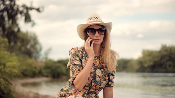 Successful Confident Businesswoman Talking On Phone Outdoor On Nature. Girl Talking On Cellphone.