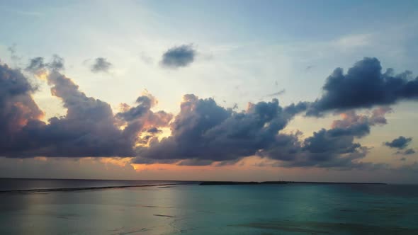 Aerial above landscape of exotic resort beach lifestyle by blue sea and white sandy background of a 