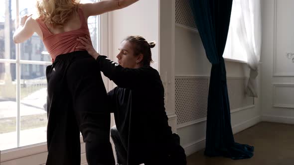 Blonde Woman and Man are Dancing Emotionally Rehearsing Contemporary Choreography