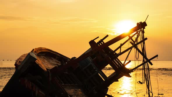 time-lapse of local fishing boat on tropical beach sunset, Thailand : 4k